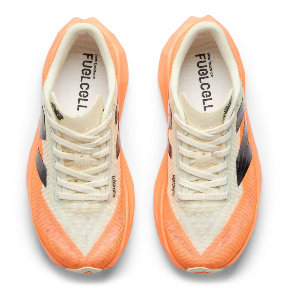 New Balance Rebel V4 Tenis naranja de mujer para correr