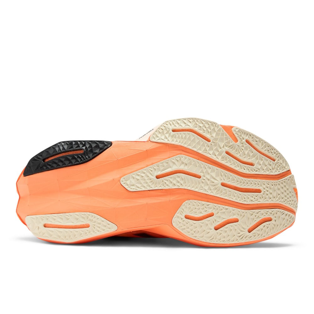 New Balance Rebel V4 Tenis naranja de mujer para correr