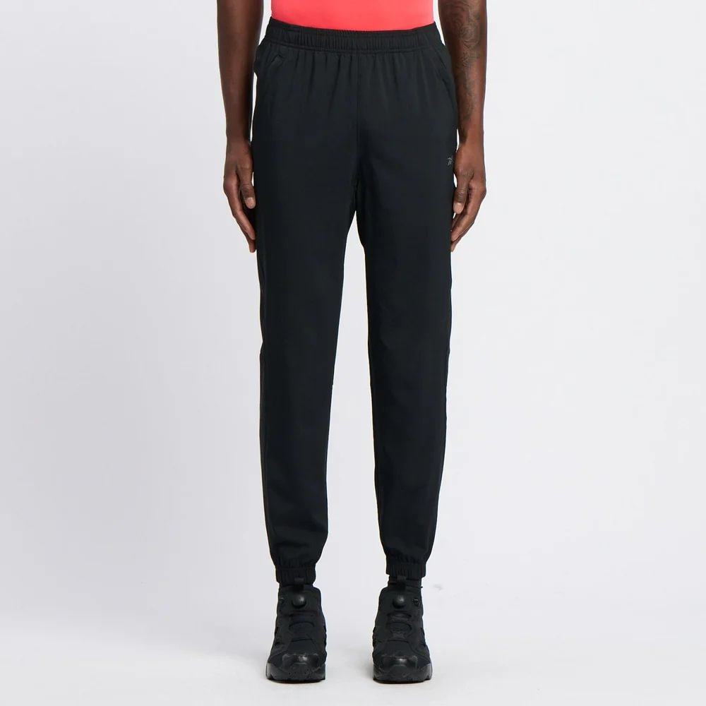 Reebok Id Train Woven Pant Pantalón negro de hombre para entrenamiento