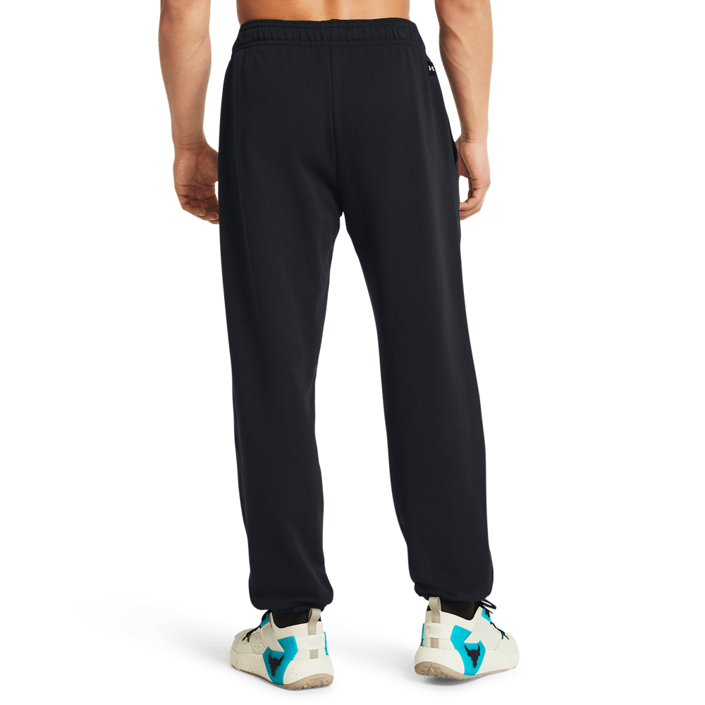 UA  Rock Hwt Terry Jgr Pantalón negro de hombre lifestyle