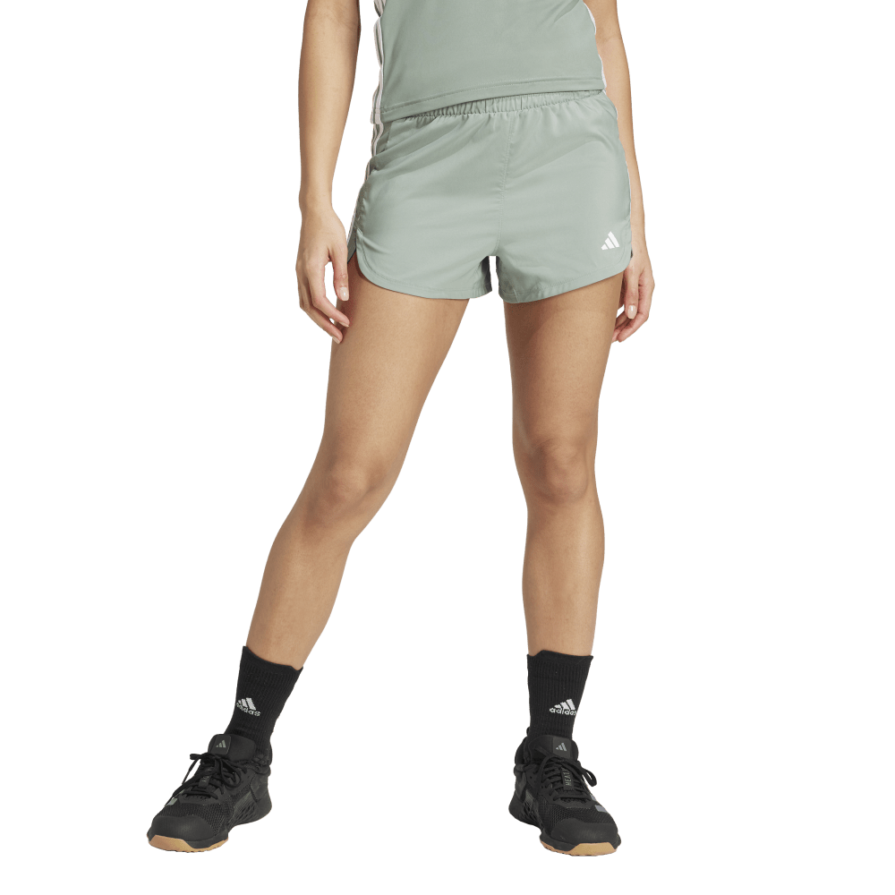 Adidas Pacer Wvn High Pantaloneta verde de mujer para entrenamiento