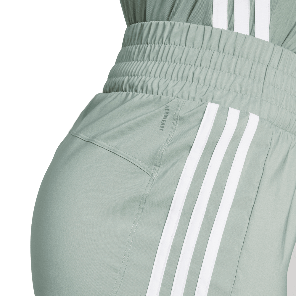 Adidas Pacer Wvn High Pantaloneta verde de mujer para entrenamiento