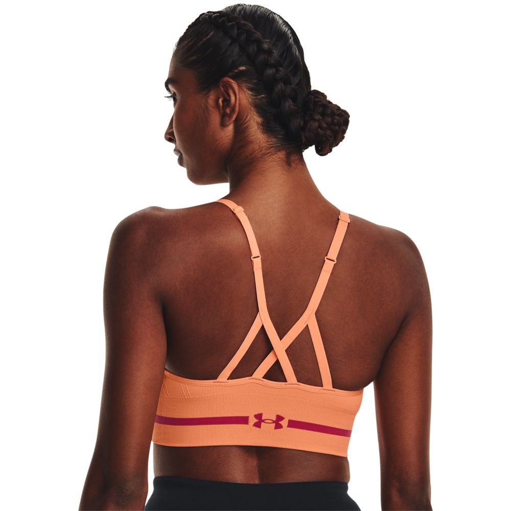 UA Seamless Low Long Bra Top naranja de mujer para entrenamiento