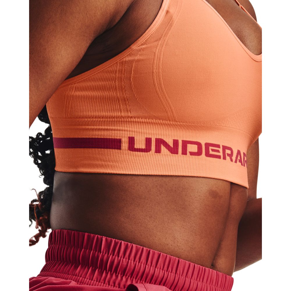 UA Seamless Low Long Bra Top naranja de mujer para entrenamiento