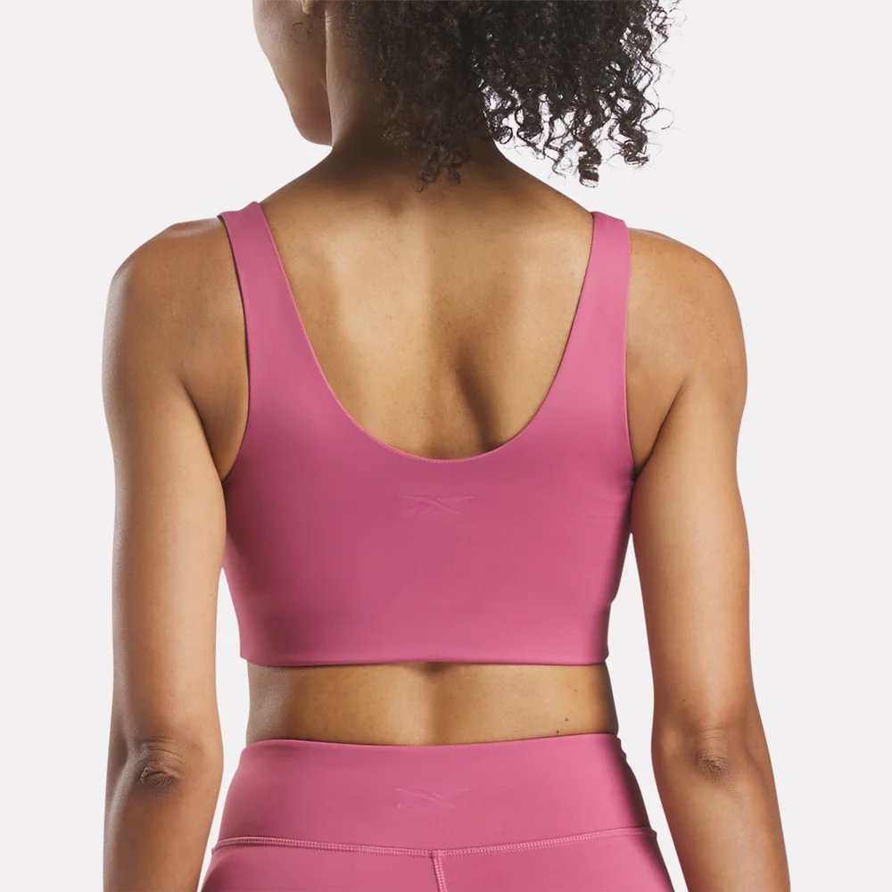 Reebok Naomi Yoga V-Neck Bra Top rosado de mujer para entrenamiento