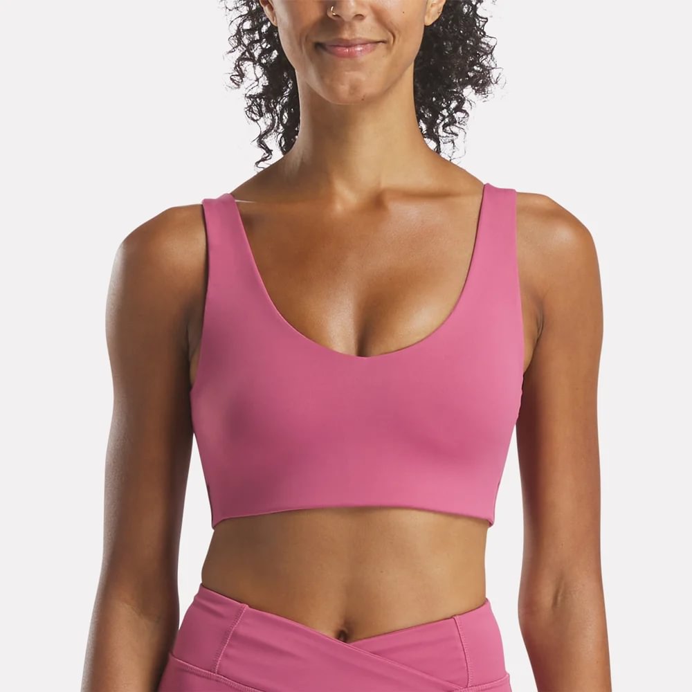 Reebok Naomi Yoga V-Neck Bra Top rosado de mujer para entrenamiento