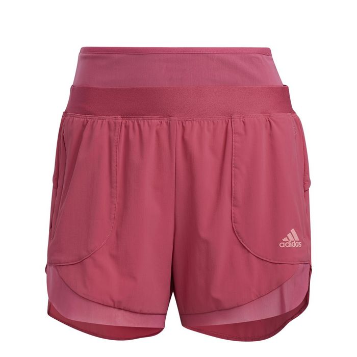 Pantaloneta-adidas-para-mujer-Elev-T-Wvn-Shor-para-entrenamiento-color-rosado.-Frente-Sin-Modelo