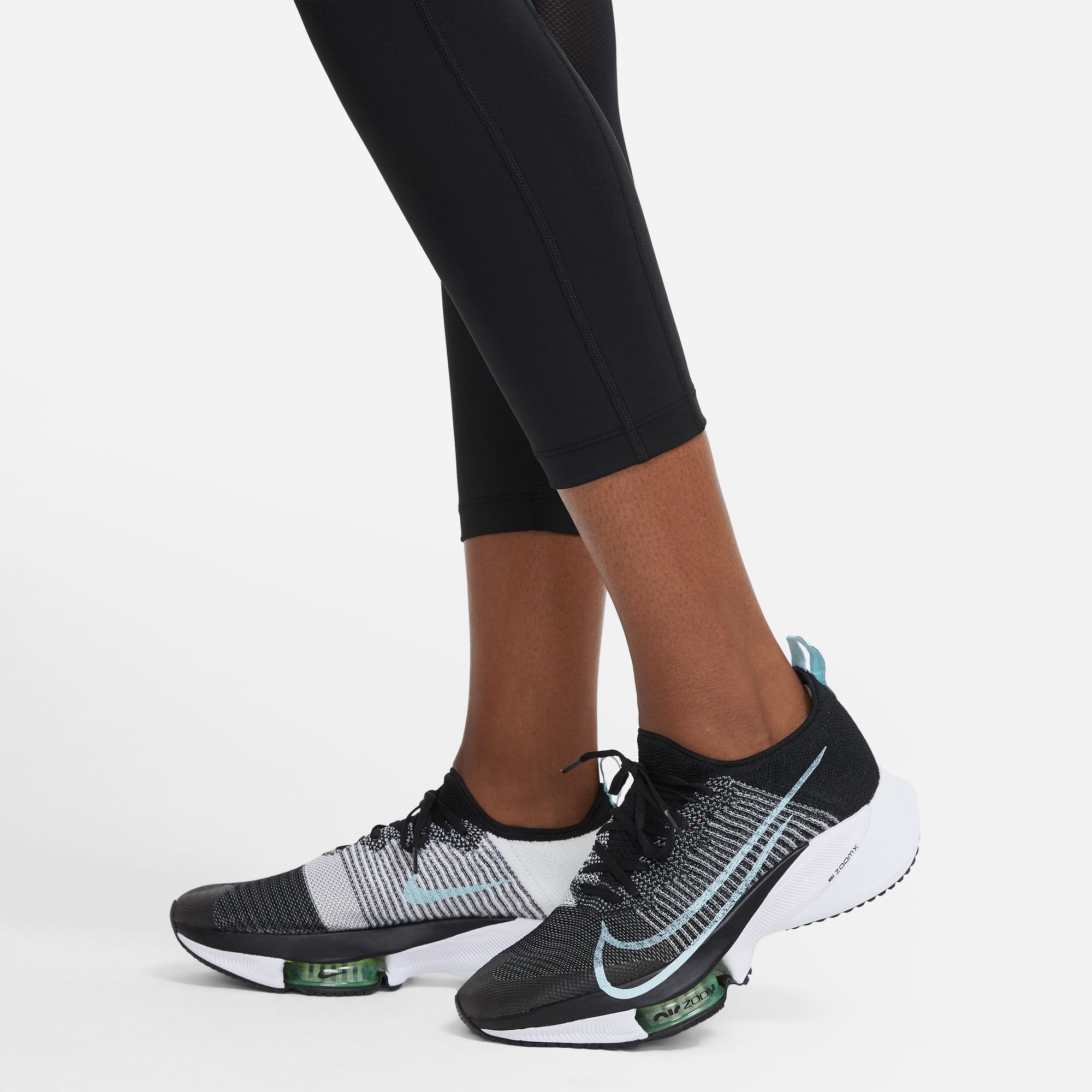 Nike W Nk Df Fast Crop Capri negro de mujer para correr